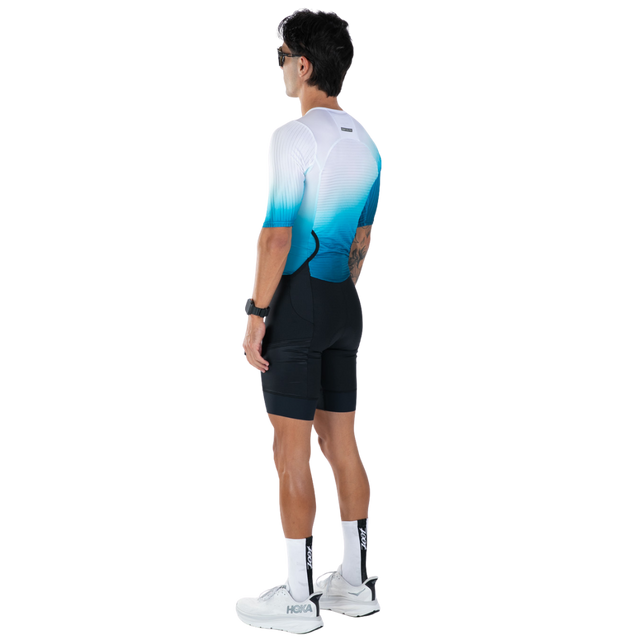 Zoot Men's Elite P1 Tri Aero FZ Racesuit in Sonic Wave colourway - back angle view, alternate